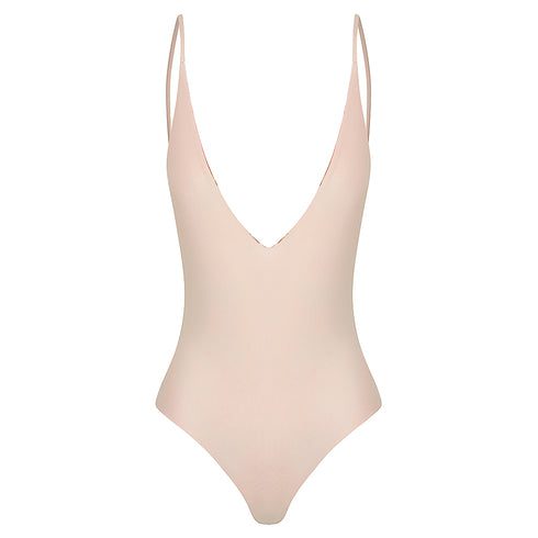 Emerald Beach One Piece in fully Reversed to soft pink , Deep V plunging neckline Moderate back coverage Mid to high waist cut Adjustable straps