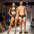 Model on Ramp Walk having Byron Bay Reversible Bikini in Festival Wolf, along with a Male Model