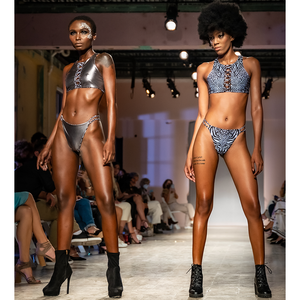 Two Models having Daydream Island Bikini Dark Animale Reversible, Detailed Zipping Back, Cheecky Cut, Seamless, High Waist, One model with dense curly hair